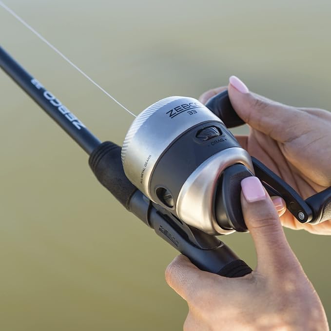 Zebco 33 Spincast Reel and 2-Piece Fishing Rod Combo, 5-Foot 6-Inch Durable Fiberglass Rod, Quickset Anti-Reverse Fishing Reel with Bite Alert