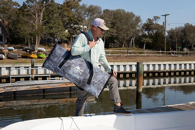 Calcutta Outdoors Pack Fish Cooler 40� x 16� | Mossy Oak Coastal Cloudbank | Insulated Waterproof Fishing Kill Bag | Sweat Proof Design | Nylon Carrying Straps�